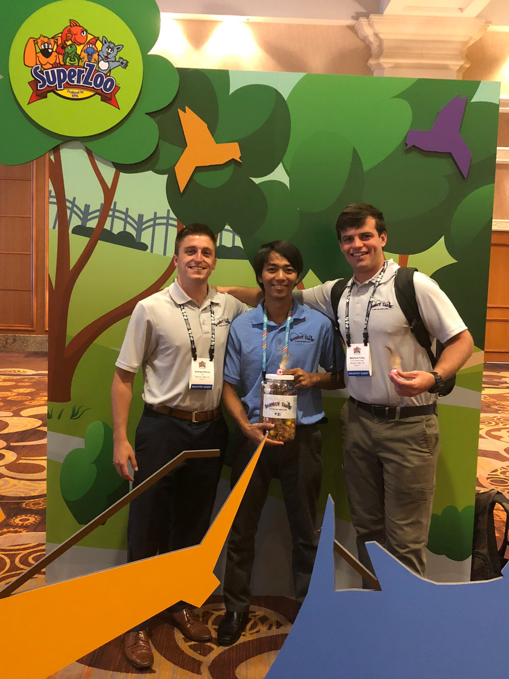The three Bouncy Tails founders at the SuperZoo pet industry trade show